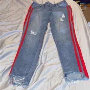 skinny jeans with red fabric on the side
